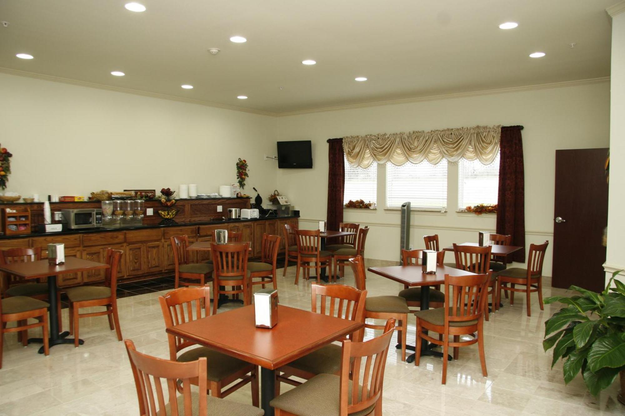 Budget Host Inn And Suites Cameron Szoba fotó